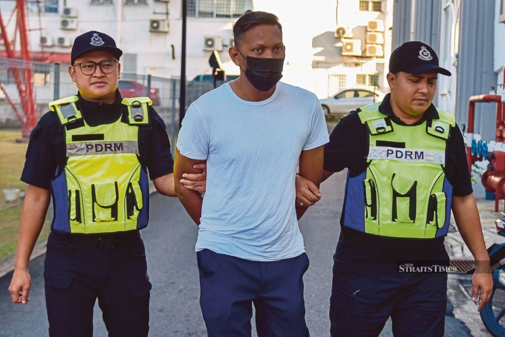 52-year-old trader Saiful Adli Yusof