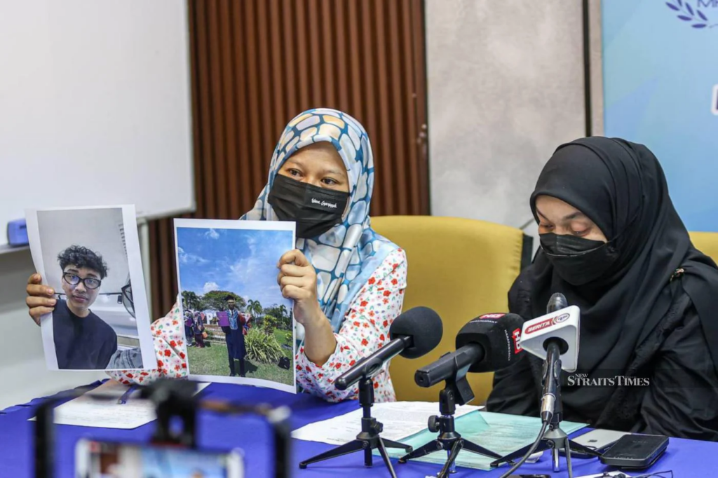 Muhammad Faiq Zafran Mohd Jailani's mother during the press conference.