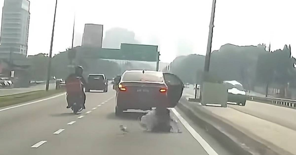 Malaysia woman jumps out of moving car after driver allegedly watches her through rearview mirror